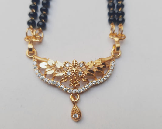 Golden mangalsutra Long 1 gram golden polish made with original A.D. stones , 30"inch long DAILY USE, 6 MONTHS WARANTY