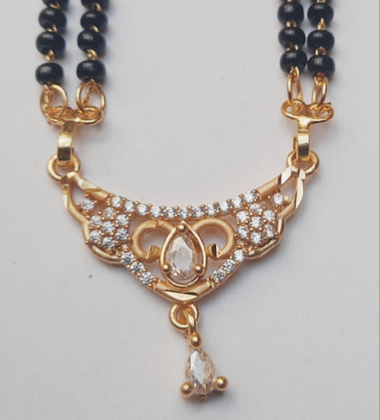 Golden mangalsutra Long 1 gram golden polish made with original A.D. stones , 30"inch long DAILY USE, 6 MONTHS WARANTY